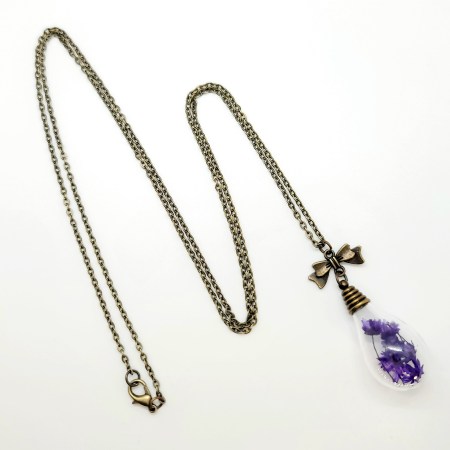 Necklace bronze glass ball with blue flowers